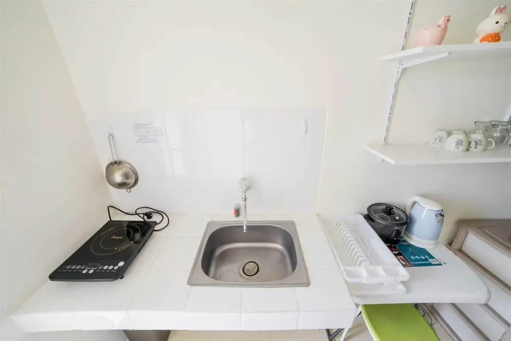 Minimalist Apartment with Sofa Bed at Parahyangan Residence