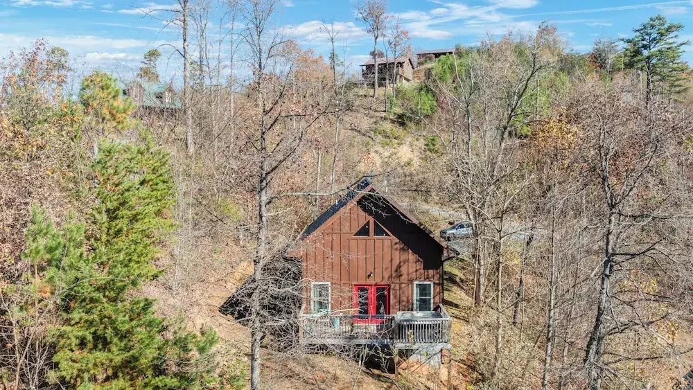 Hot Tub, Game Loft, Open Living, Minutes to Downtown Gatlinburg Whisper Cabin by Avantstay