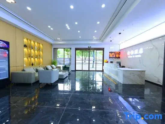 Junyi Business Hotel (Jishou Private Community Building Materials Home Furnishing Exhibition Center)