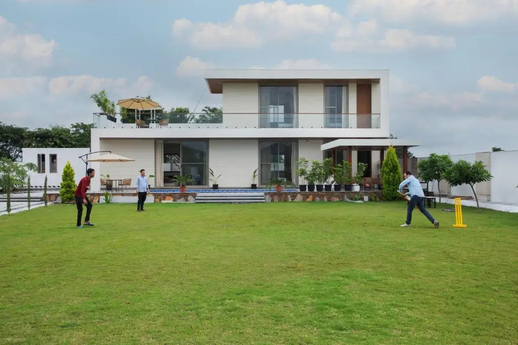 SaffronStays Raaga - luxury 4BR villa with private pool, lawns, gazebos & sweeping Aravalli hill vie