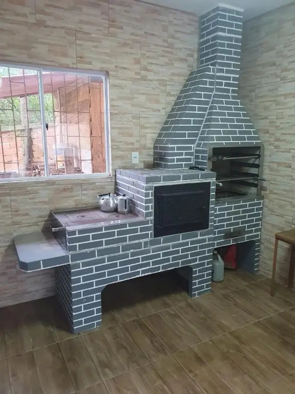 Casa com 2 dormitórios entre Praia do Rosa e Barra de Ibiraquera