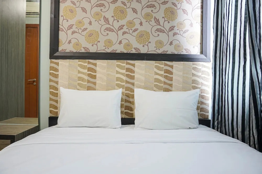 Best Location and Cozy 2BR The H Residence Apartment By Travelio