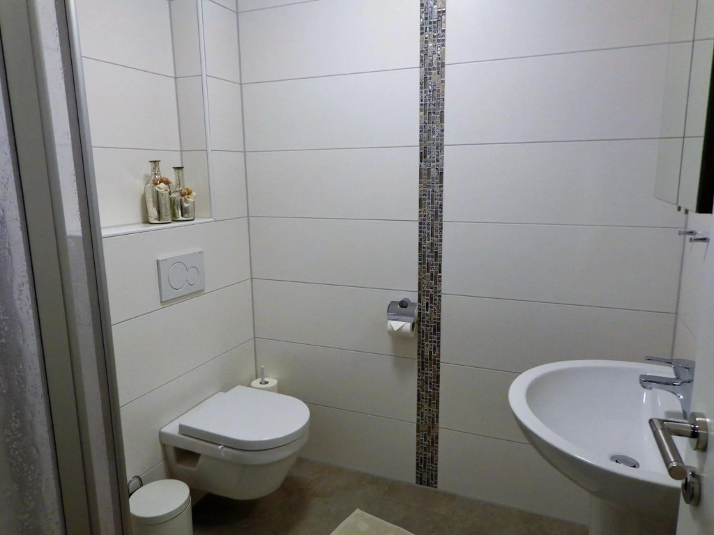 Ostfrieslands Perle Ferienwohnung an der Nordseeküste, Sauna, Terrasse, Garten, ruhige Lage, WLAN