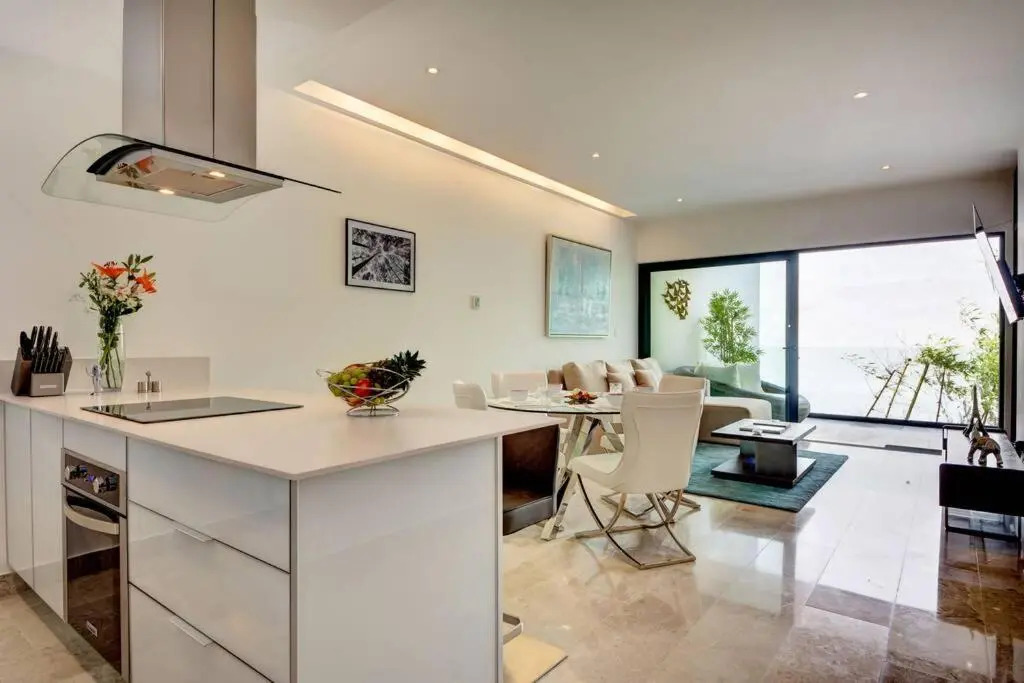 Brand New Classy Condo Just Steps from the Beach