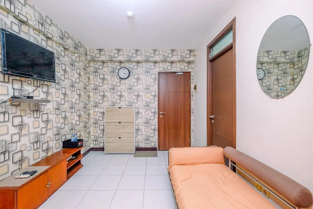 Cozy Living and Comfortable 2BR at Lagoon Bekasi Town Square Apartment By Travelio