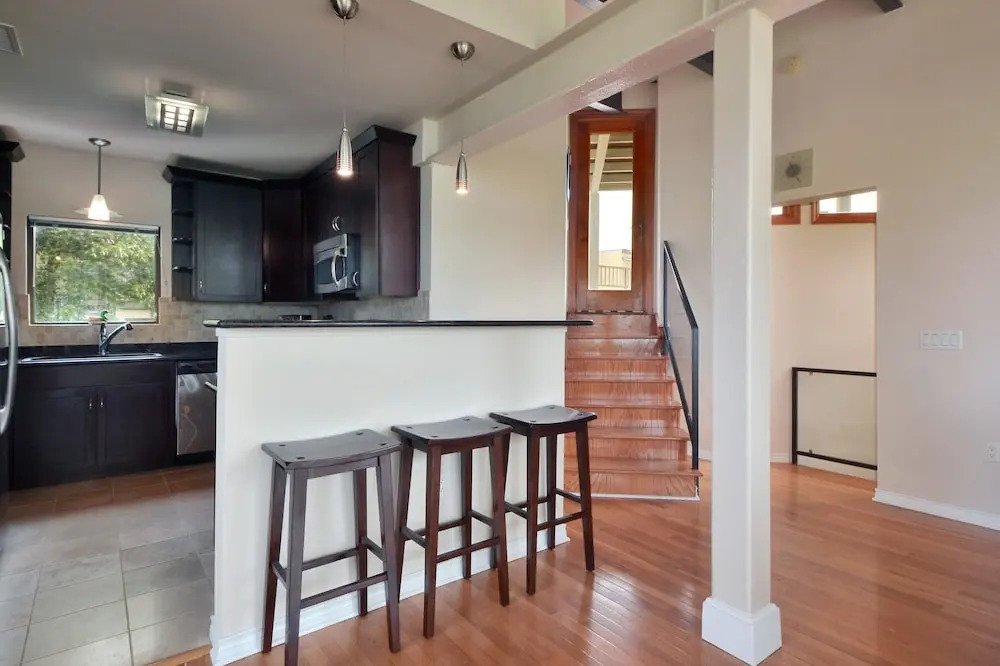W 6th St Penthouse with City Views by RedAwning