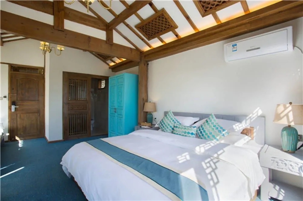 Floral Hotel Lijiang QianlizoudanjiYunju