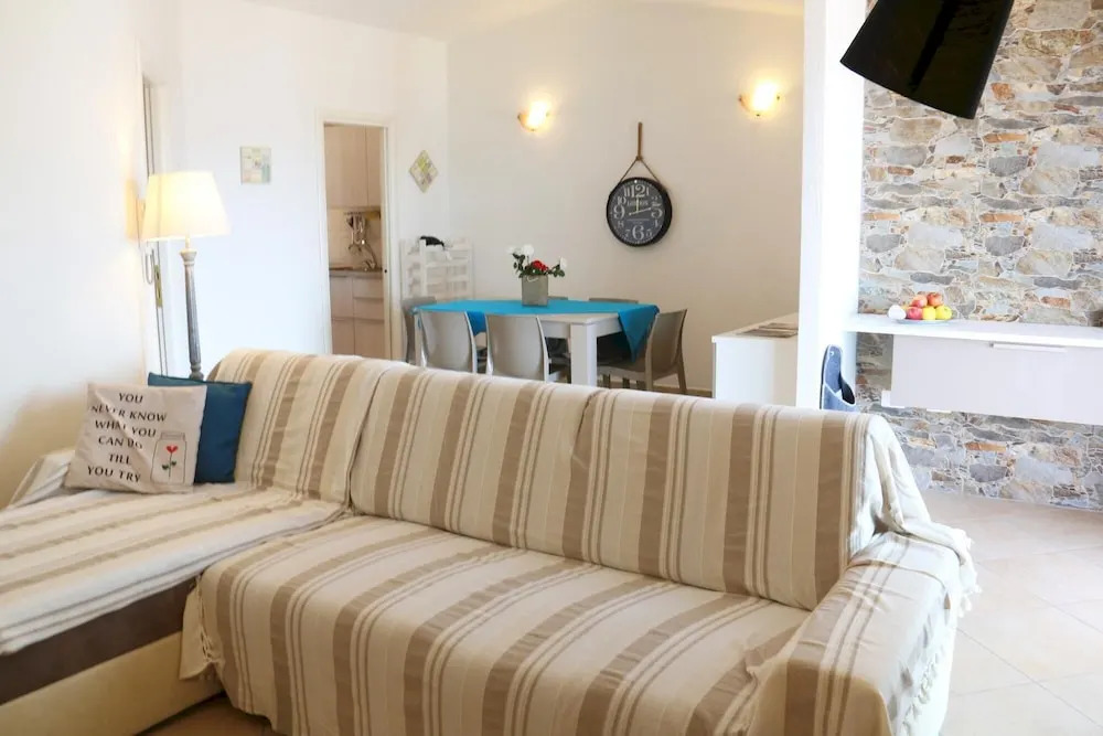 Attico Baja Ostina 3 Bedrooms Apartment in Terrabianca