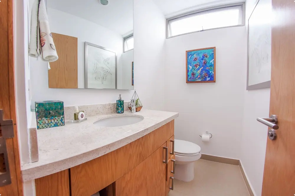 Fun and Relaxing  2BR PH steps away from the beach by Happy Address