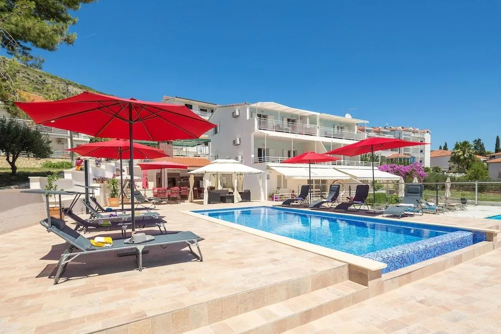 Gem of the sea luxury beach apartment with brand new heating infinity pool