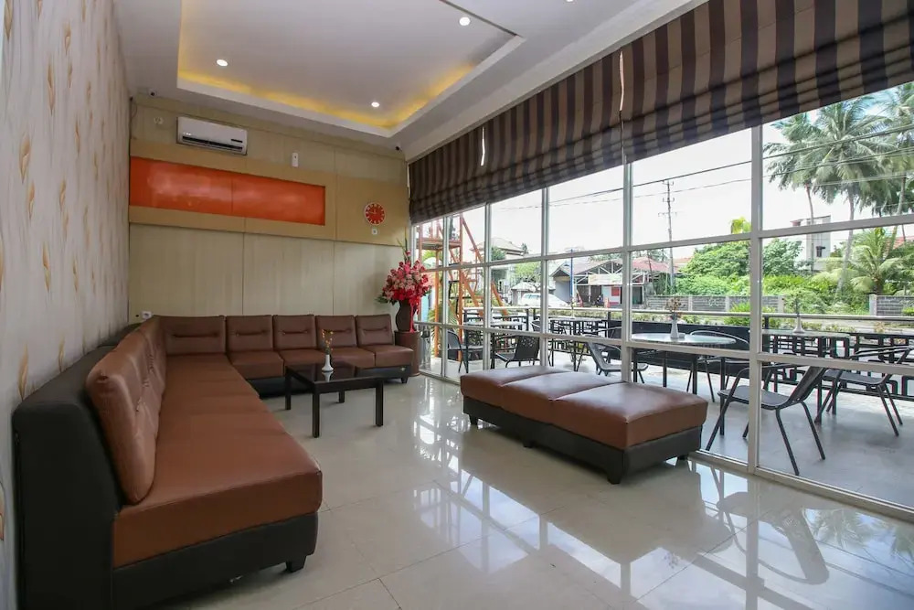 Airy Mapanget AA Maramis Manado