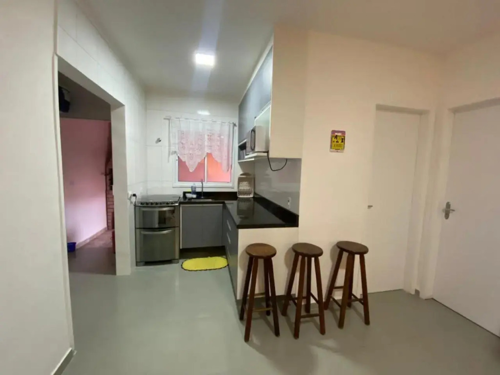 Casa em Bertioga condomínio 250 metros da praia