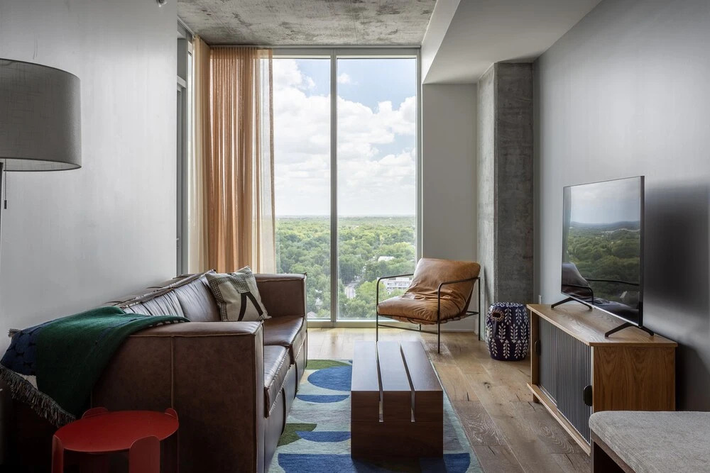 20th floor condo with pool on Rainey St by Locale