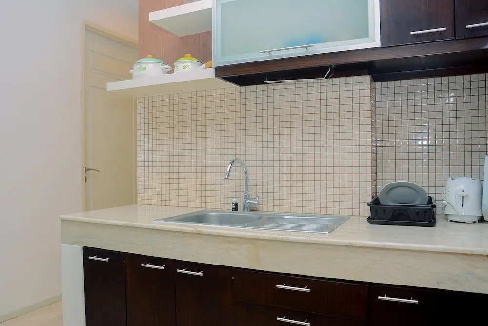 Modern 2 BR Apartment @ FX Residence with City View By Travelio