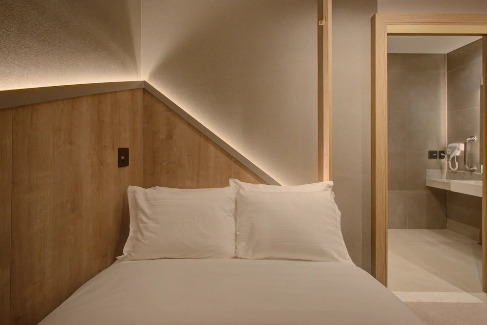 Fast Sleep Suites by Slaviero Hotéis dentro do Aeroporto Guarulhos Terminal 2, desembarque Oeste