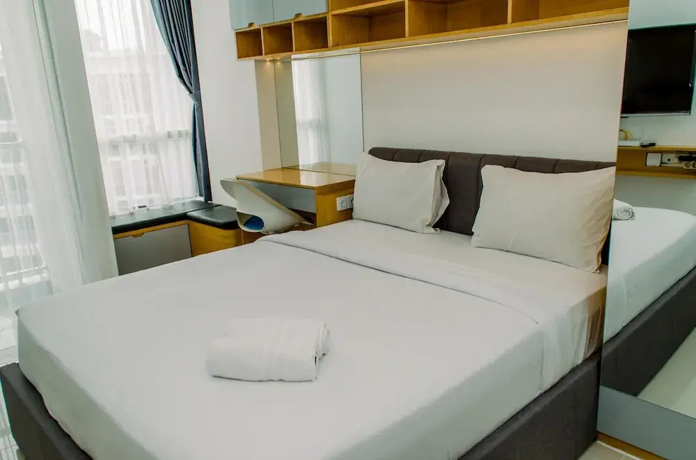 Nice and Elegant Studio near Campus at Pacific Garden Alam Sutera Apartment By Travelio