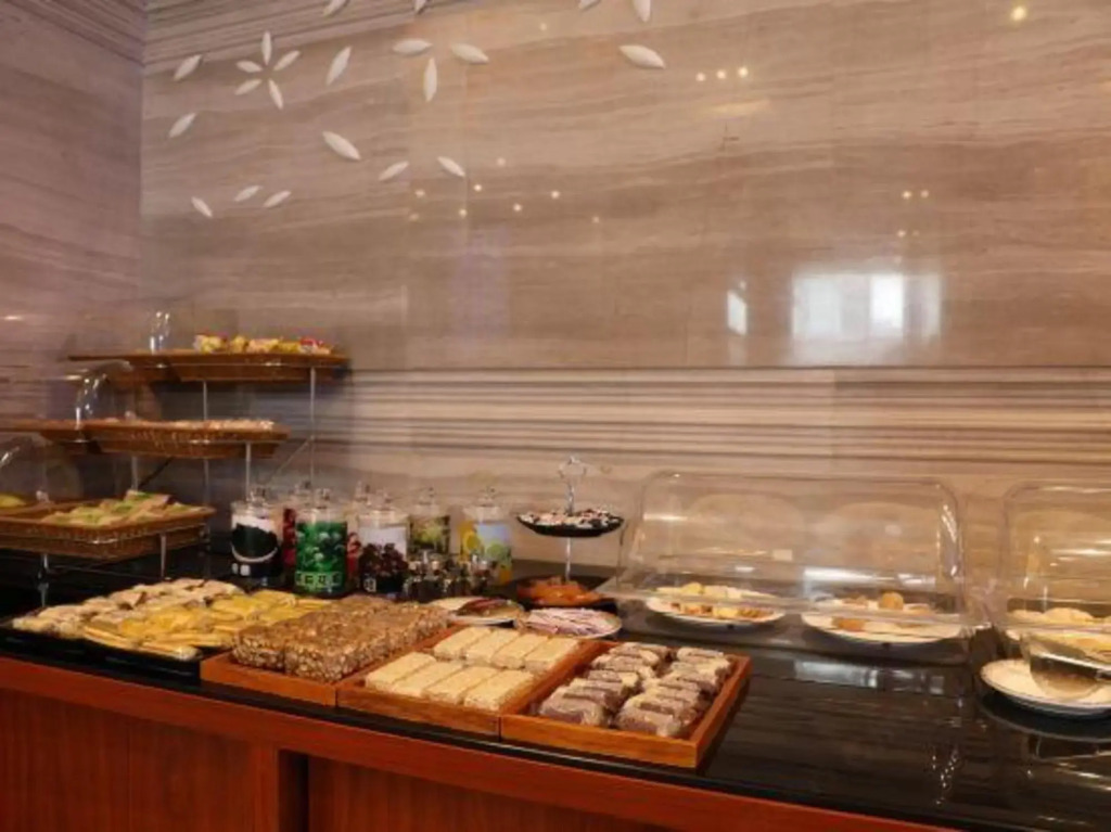 Sweet Fruit Charm International Hotel (Foshan West Station Shati Airport Store)