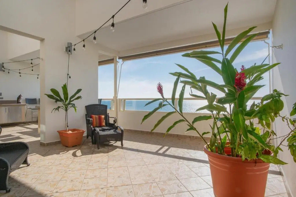 Beachfront Penthouse with Ocean and Sunset Views at Pelican Reef #703