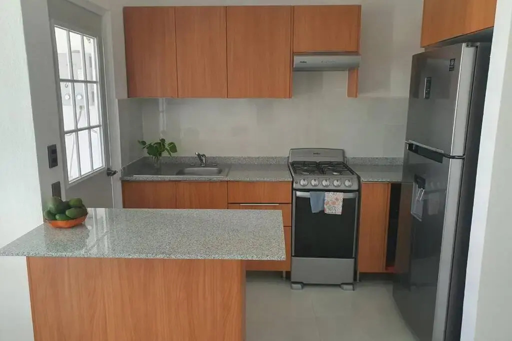 Departamento de lujo en Manzanillo, planta baja frente a la alberca