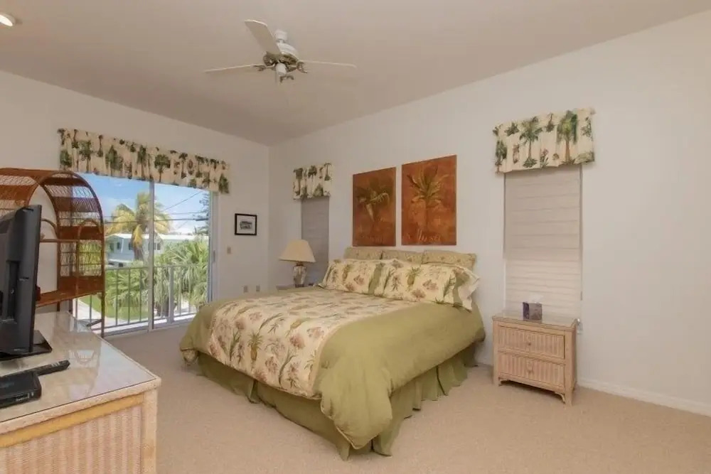 Beautiful House Located In The Prestigious Neighborhood Of Port Antigua On A Deep, Wide Canal. 4 Bedroom Home by RedAwning