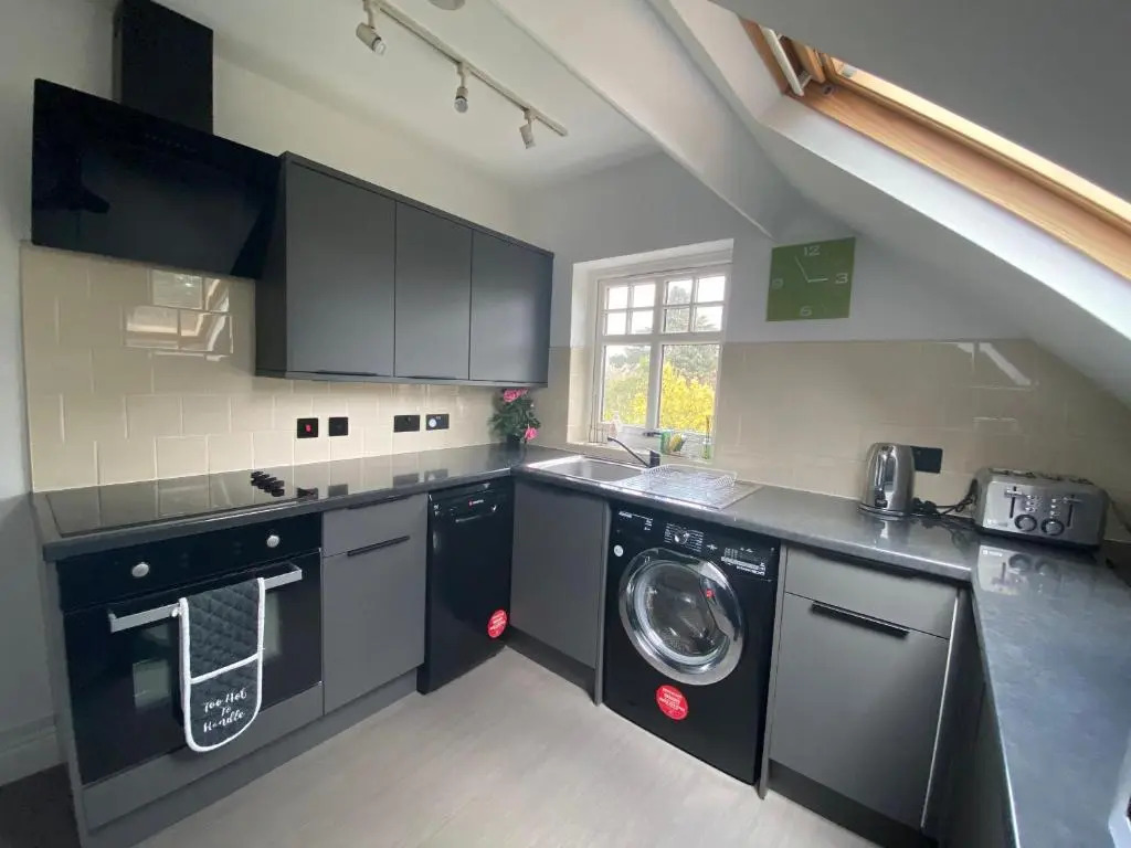 Pristine 2 bedroom apartment with off street parking