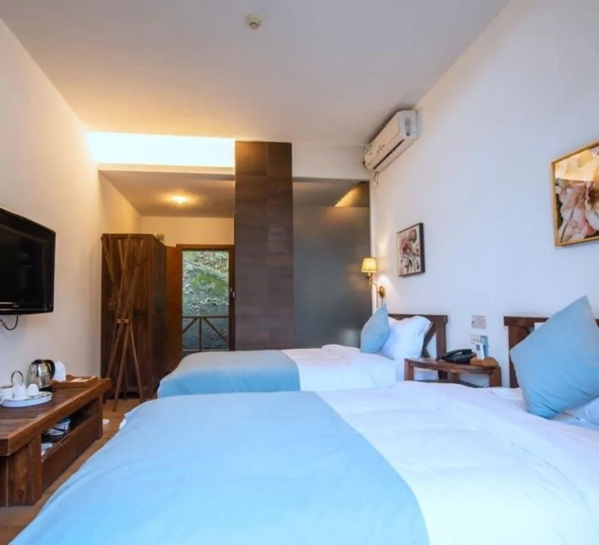 Floral Hotel Qing Lan Ju Dragon Valley