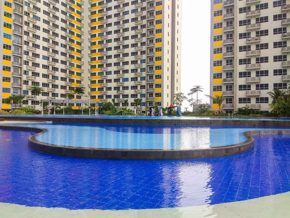 New Furnsihed Studio Room Apartment at Springlake Bekasi By Travelio