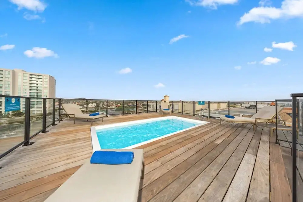 Modern Corner Unit Pool Steps From Palm Beach