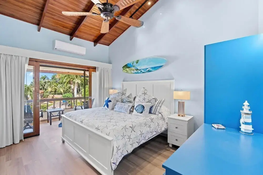 Stylish 2-Bedroom Beach Condo with Ocean-View Deck, Lush Pool Area & 2-Minute Walk to Flamingo Beach