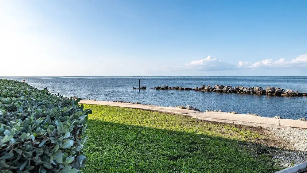 Bayfront Townhome With Boat Slip, Pool And Beach 2 Bedroom Townhouse by RedAwning