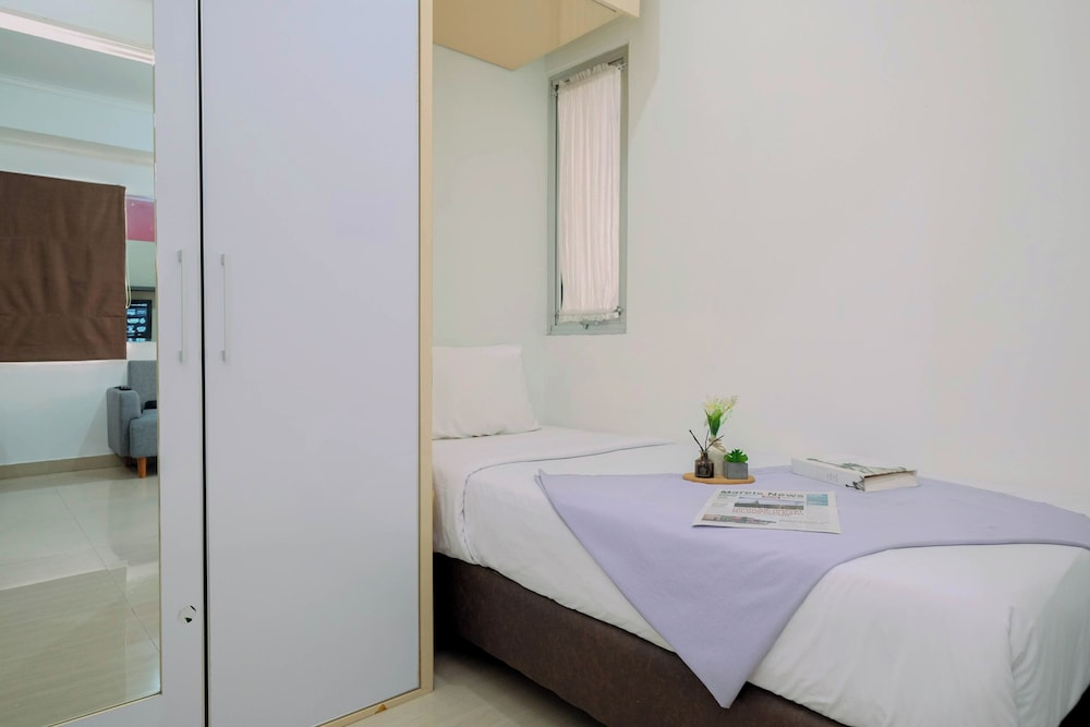 Compact White Tone 2Br At Pakubuwono Terrace Apartment