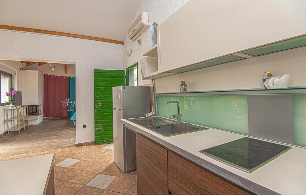 Awesome Home in Jezera with Hot Tub, WiFi & 1 Bedrooms
