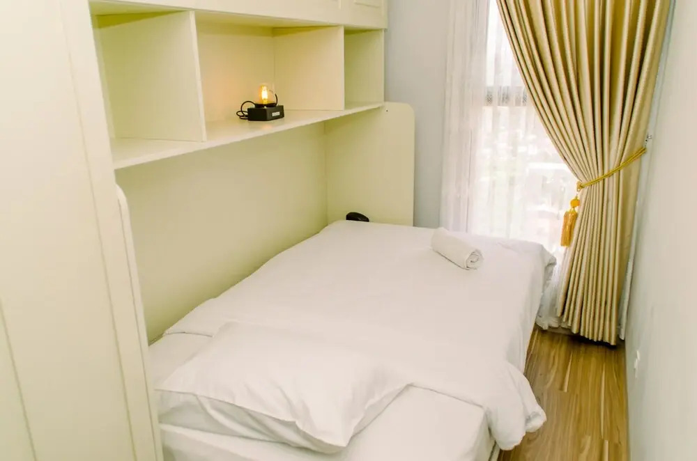 Comfort and Homey 2BR at Transpark Bintaro Apartment By Travelio