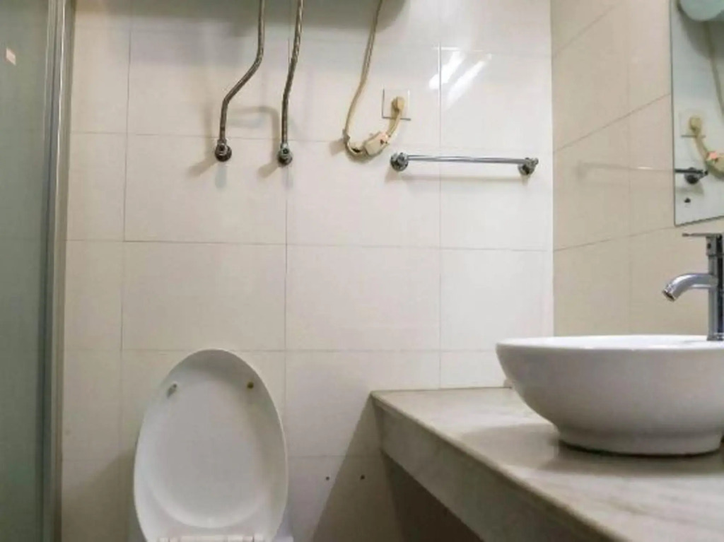 Paojiang Xinyuansu Business Hotel
