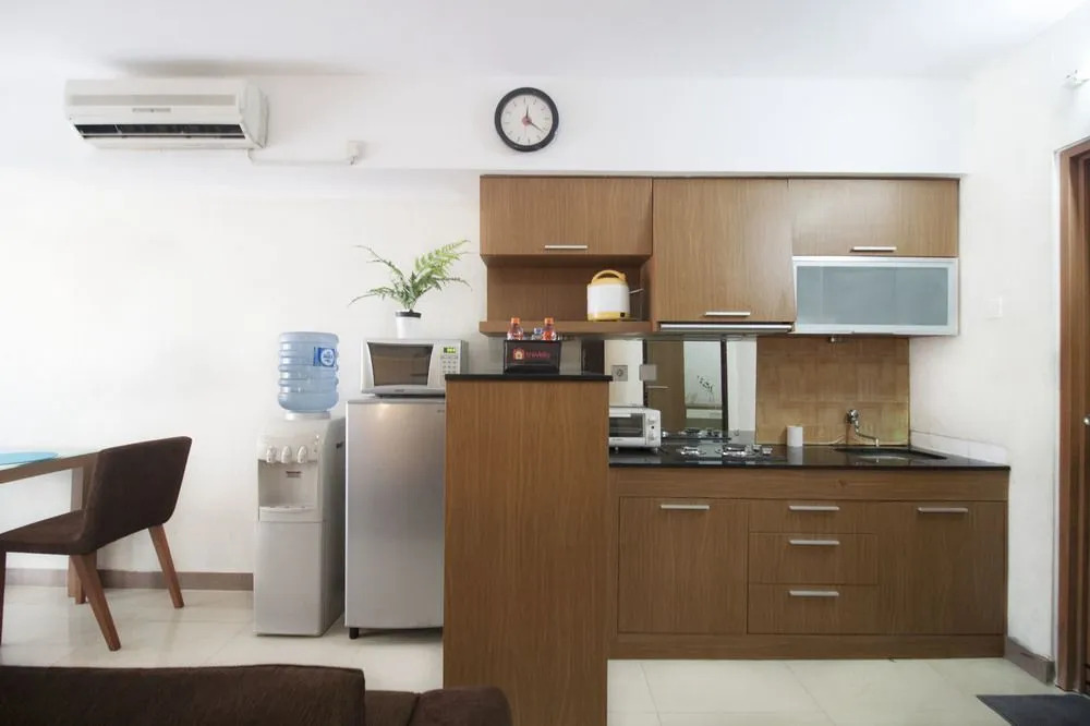 2BR Cozy at Empyreal Epicentrum Apartment By Travelio