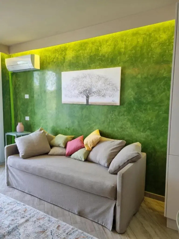 Appartamento ORCHIDEA a Sirmione sul Lago di Garda con piscina, giardino e spiaggia con molo