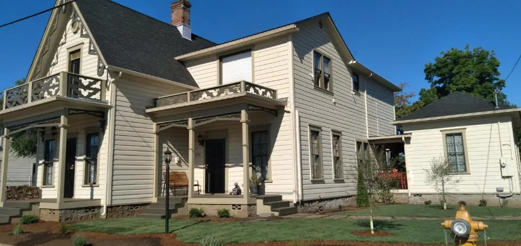 HISTORICAL JOHN RAST HOUSE with Ev station