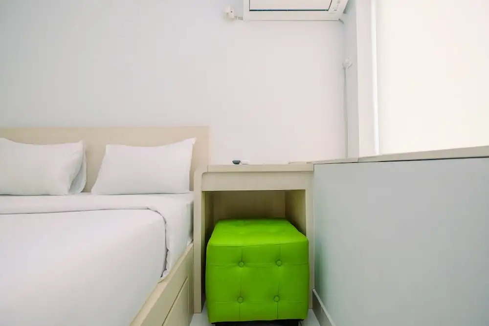 Minimalist and Cozy 1BR Patraland Urbano Apartment By Travelio