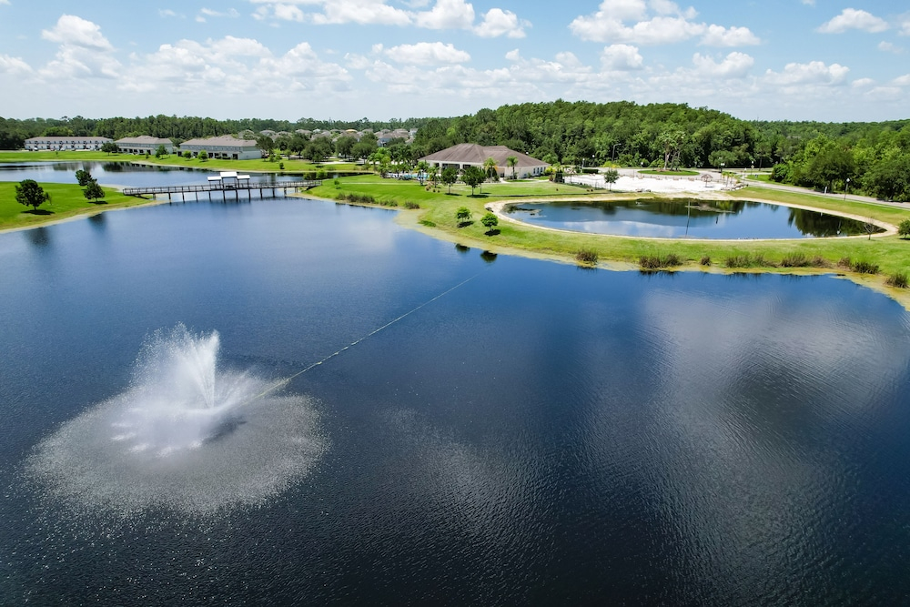 Updated Retreat With Pool Access, W/d, AC, & Patio - Close to Disney Parks