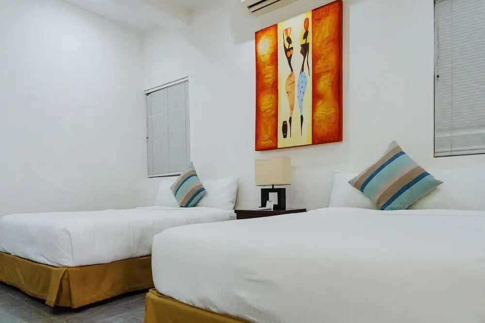 Dangelos 5ta Avenida Hotel
