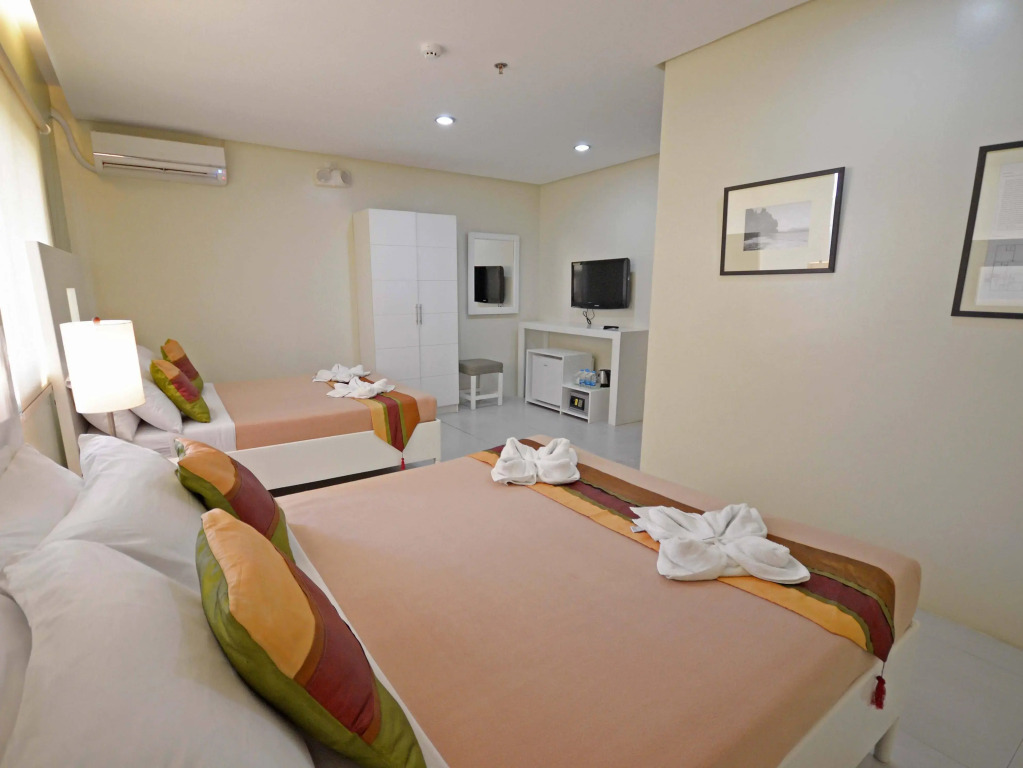 Holiday Suites Business District - formerly Empire Suites Hotel