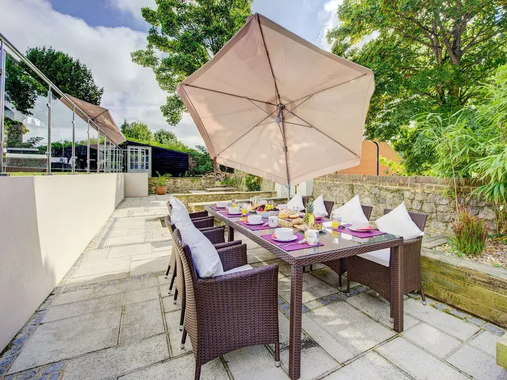 With two Terraces Overlooking the Town of Hythe and the sea in the Distance