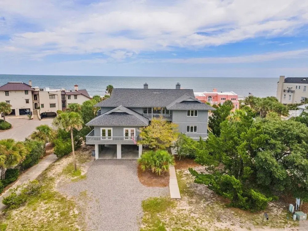 Take Your Shoes Off Relax And Put Your Feet In The Sand. 7 Bedroom Home by Peace Vacations