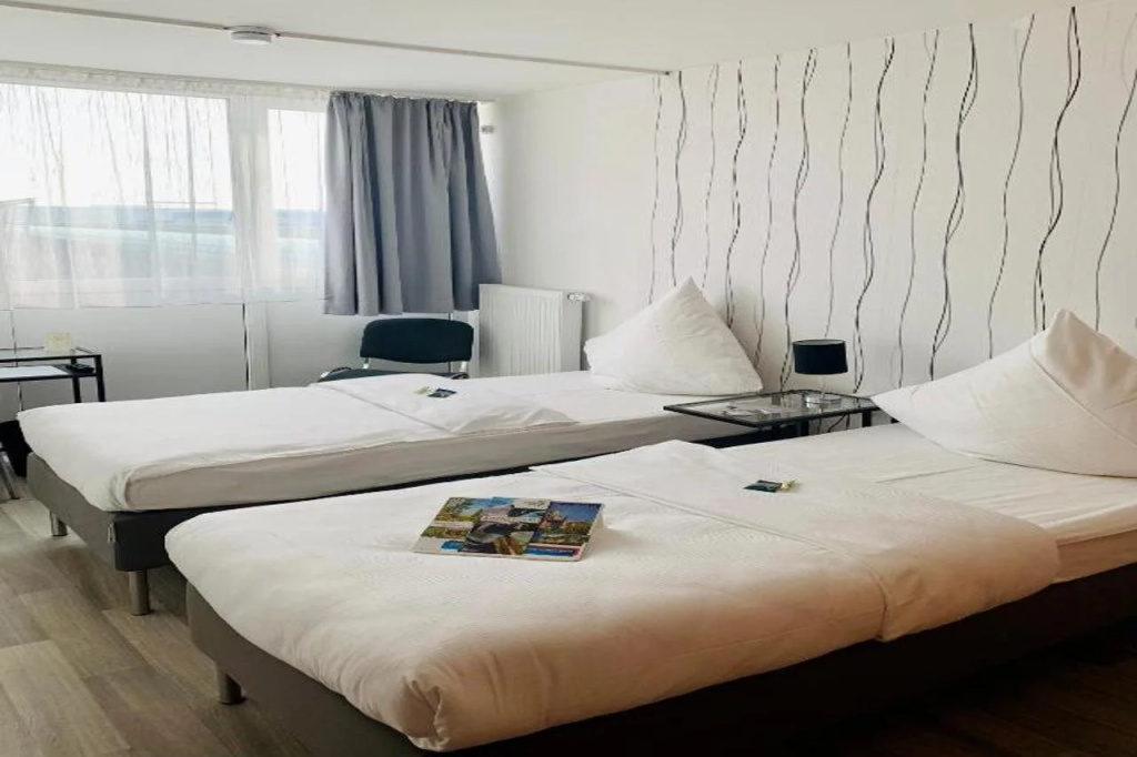 Отель BeeVillage Messehotel Hannover-Laatzen
