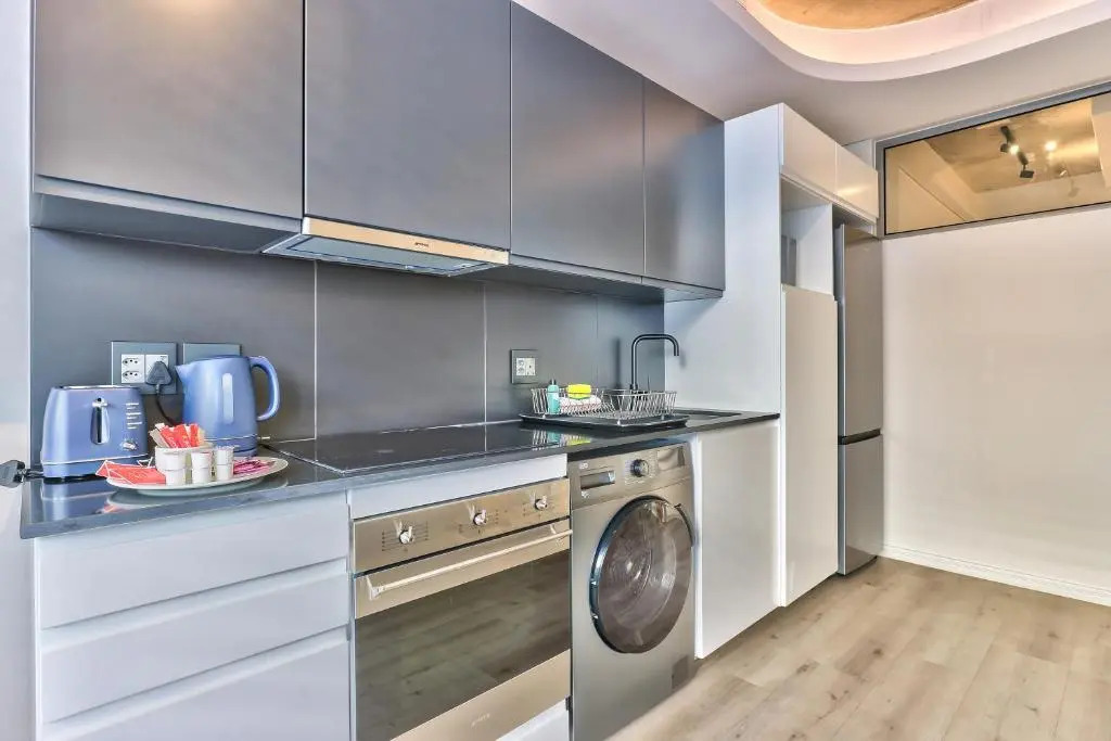 One Bedroom With Balcony and City Views