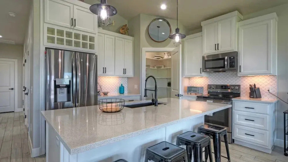 Bayfront Home w/ Pool, Game Room + Walk to Beach & Golf Cart Access Pelicans Perch by Avantstay