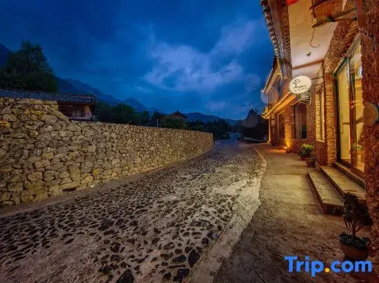 Listening to the wind · Courtyard Green Forest Rizhao Jinshan View Inn (Yulong Snow Mountain)