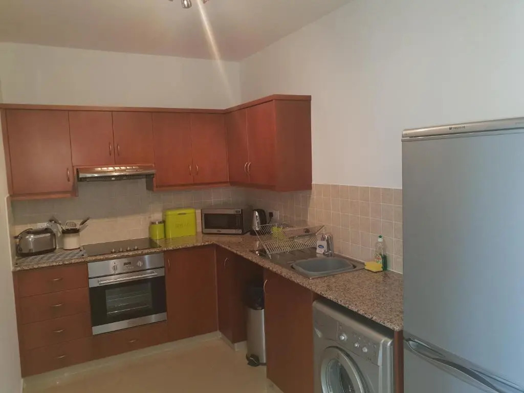 Stunning apartment C106 with balcony looking over pool