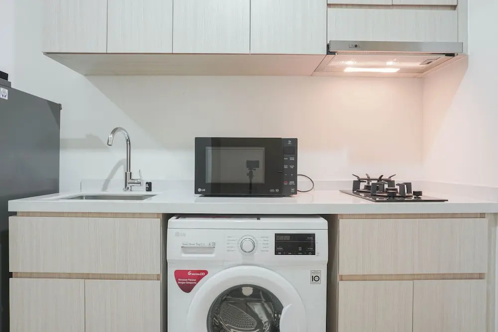 Comfy 1BR Sedayu City Suites Apartment