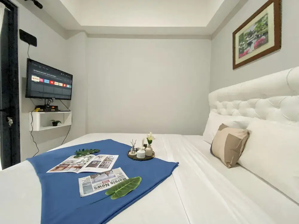 Minimalist And Cozy 1BR at Royal Heights Apartment